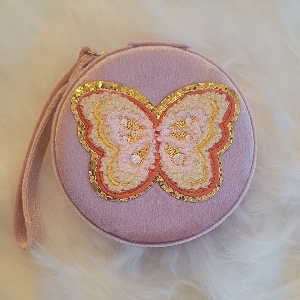 Pink butterfly travel jewelry case box. Plush exterior gold zipper. Strap.